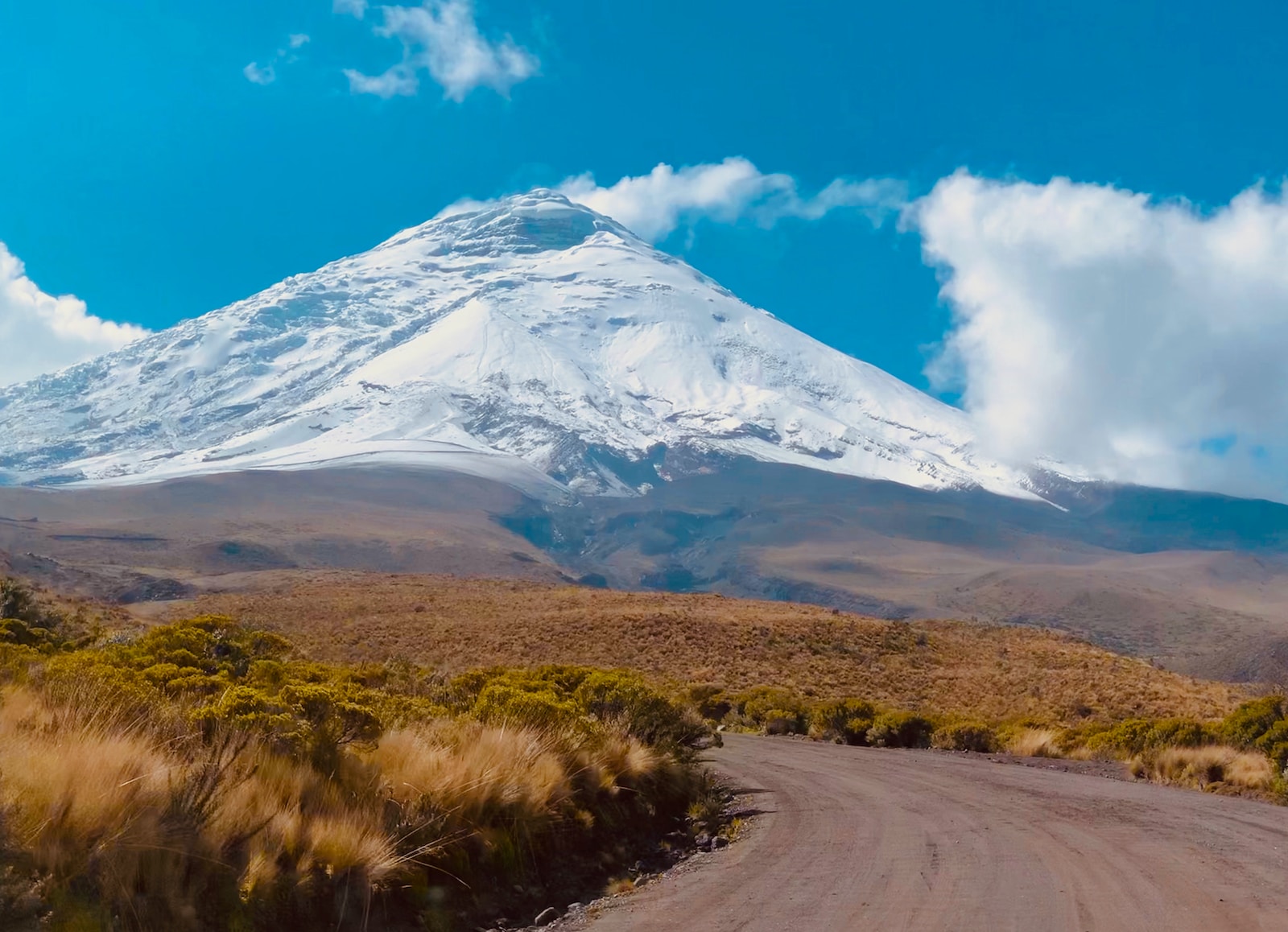 Cotopaxi white and black mountain under blue sky during daytime